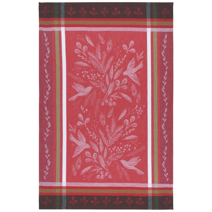 Red towel with white floral and bird pattern on a white background