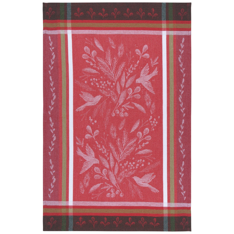 Red towel with white floral and bird pattern on a white background