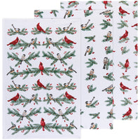Set of Christmas-themed kitchen towels with bird and berry pattern on a white background